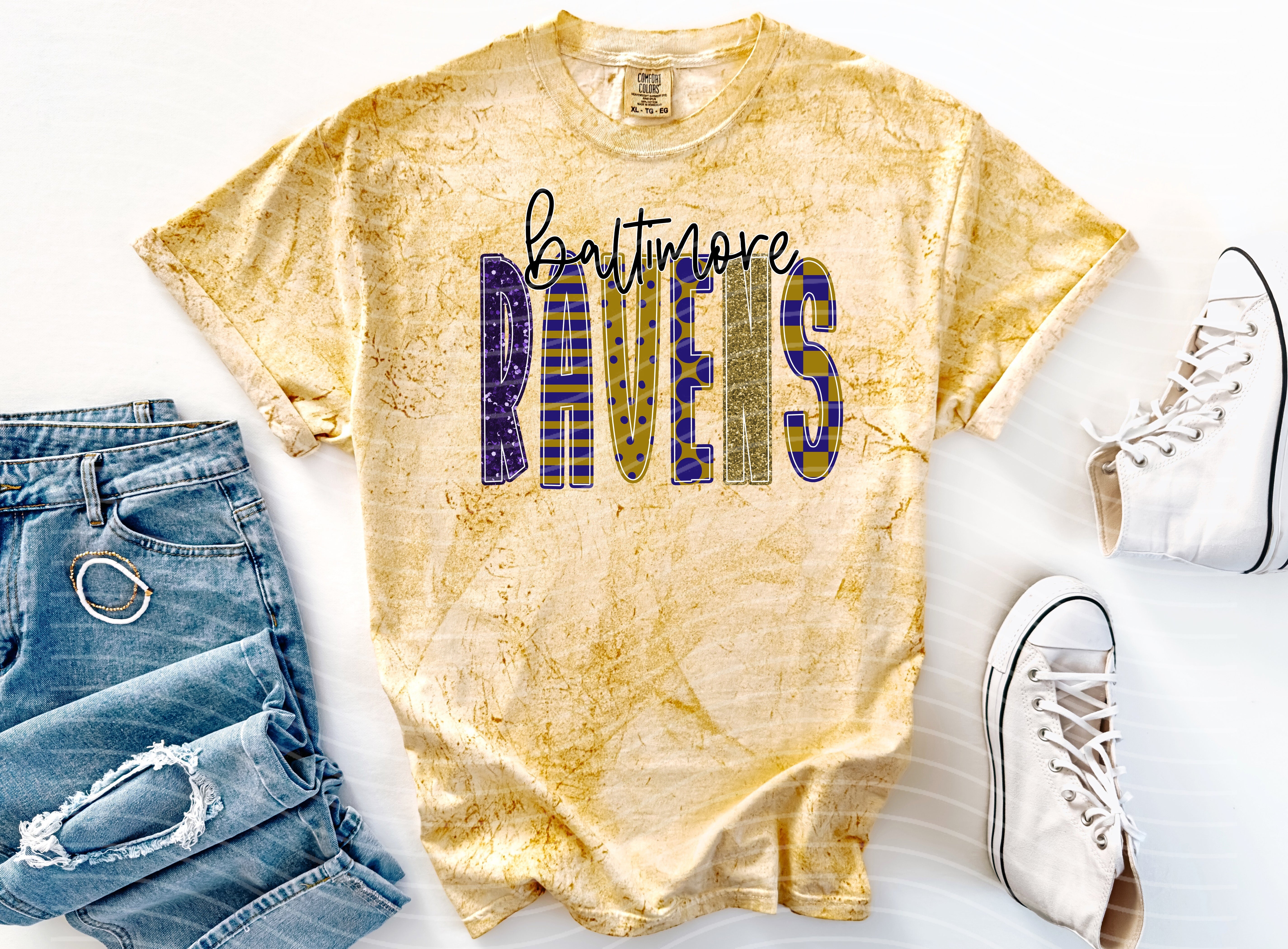 Ravens Doodle Font graphic tee by Anchored Grace Boutique, featuring a black and white raven doodle design on a casual cotton t-shirt.