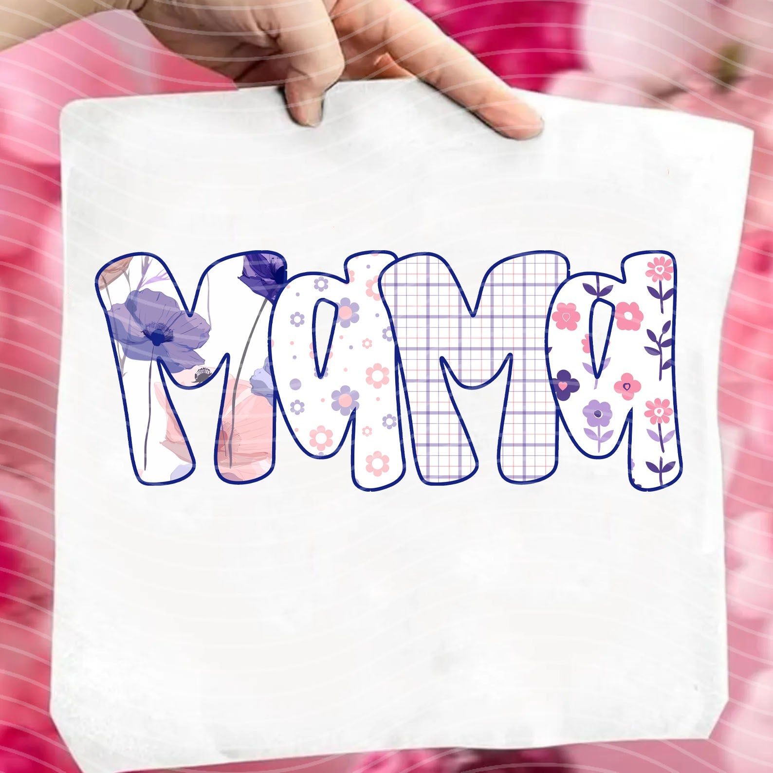 Pink and purple floral graphic tee with "Mama" name design from Anchored Grace Boutique, casual women's T-shirt.