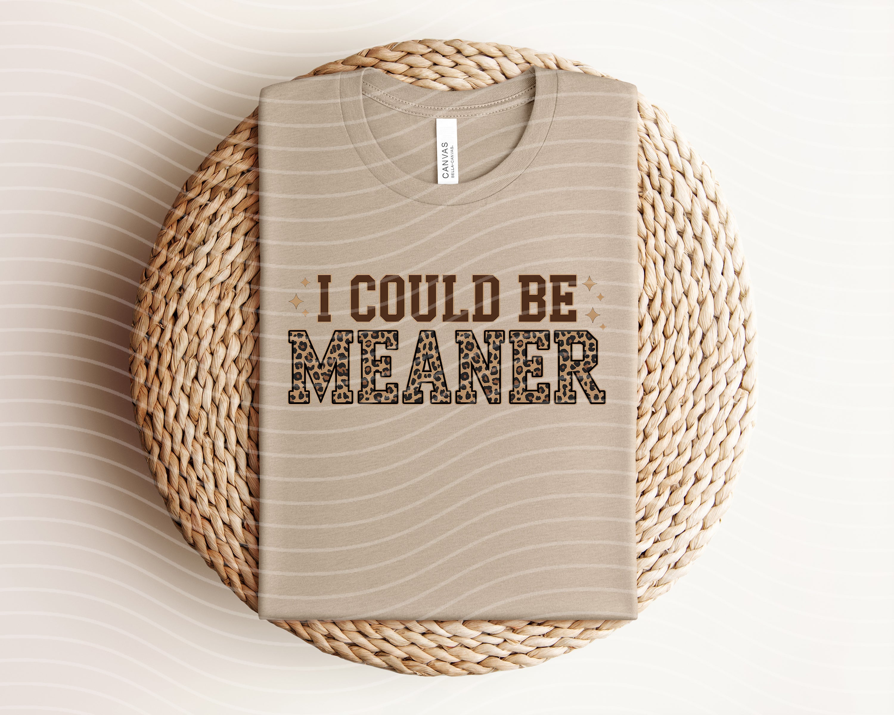 Black "I Could Be Meaner" graphic tee by Anchored Grace Boutique, front view showing bold white text on soft cotton fabric.