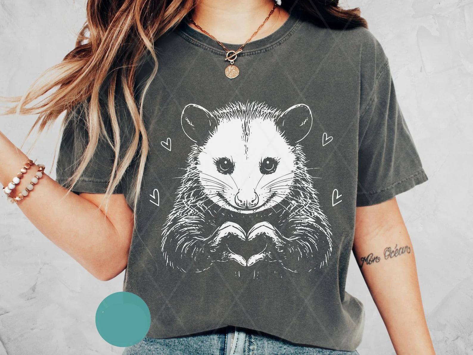 Black and white possum graphic tee from Anchored Grace Boutique, featuring a stylish wildlife illustration on a casual cotton t-shirt.