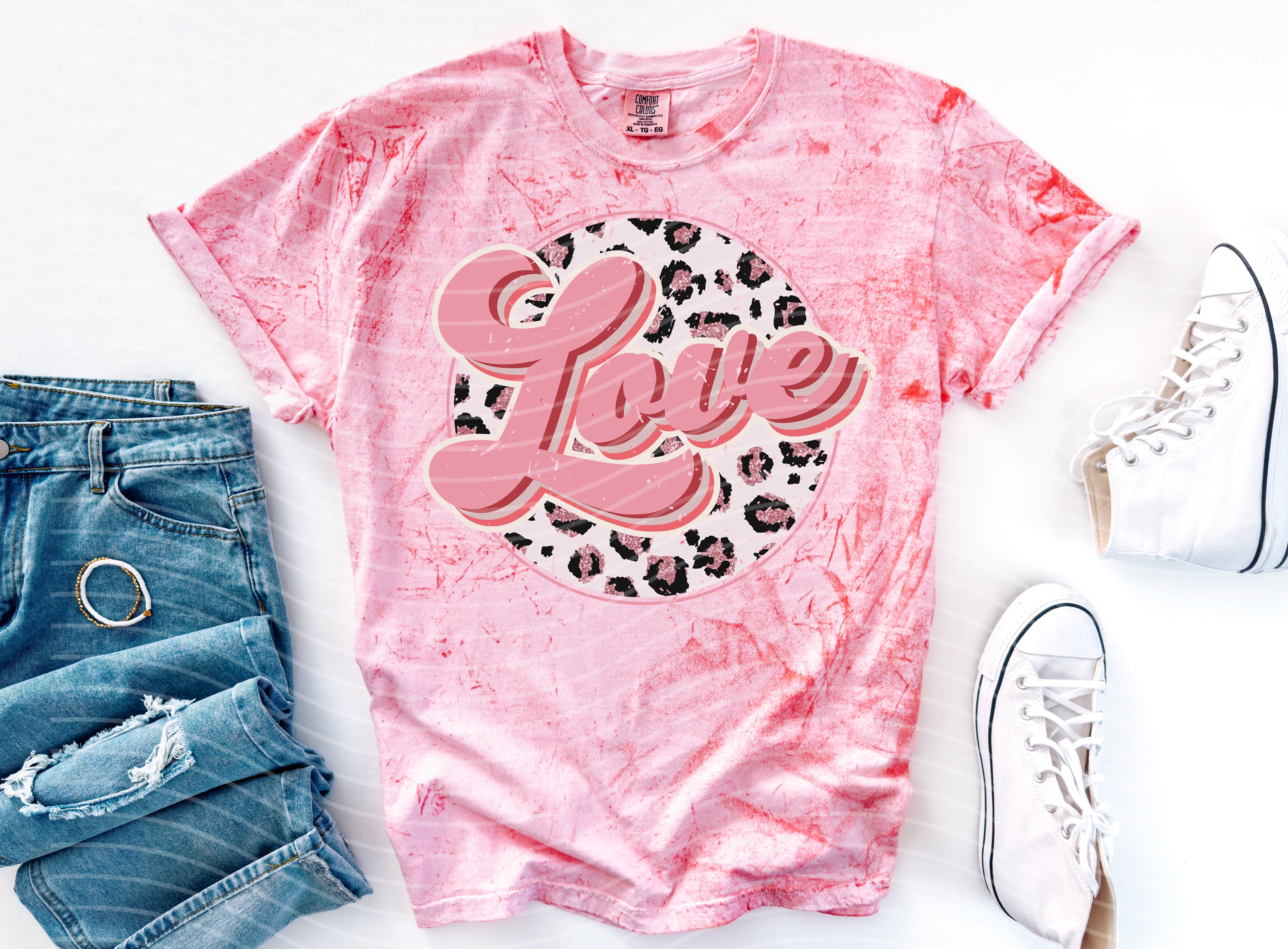 Love Leopard graphic tee from Anchored Grace Boutique featuring a stylish leopard print design on a casual t-shirt.