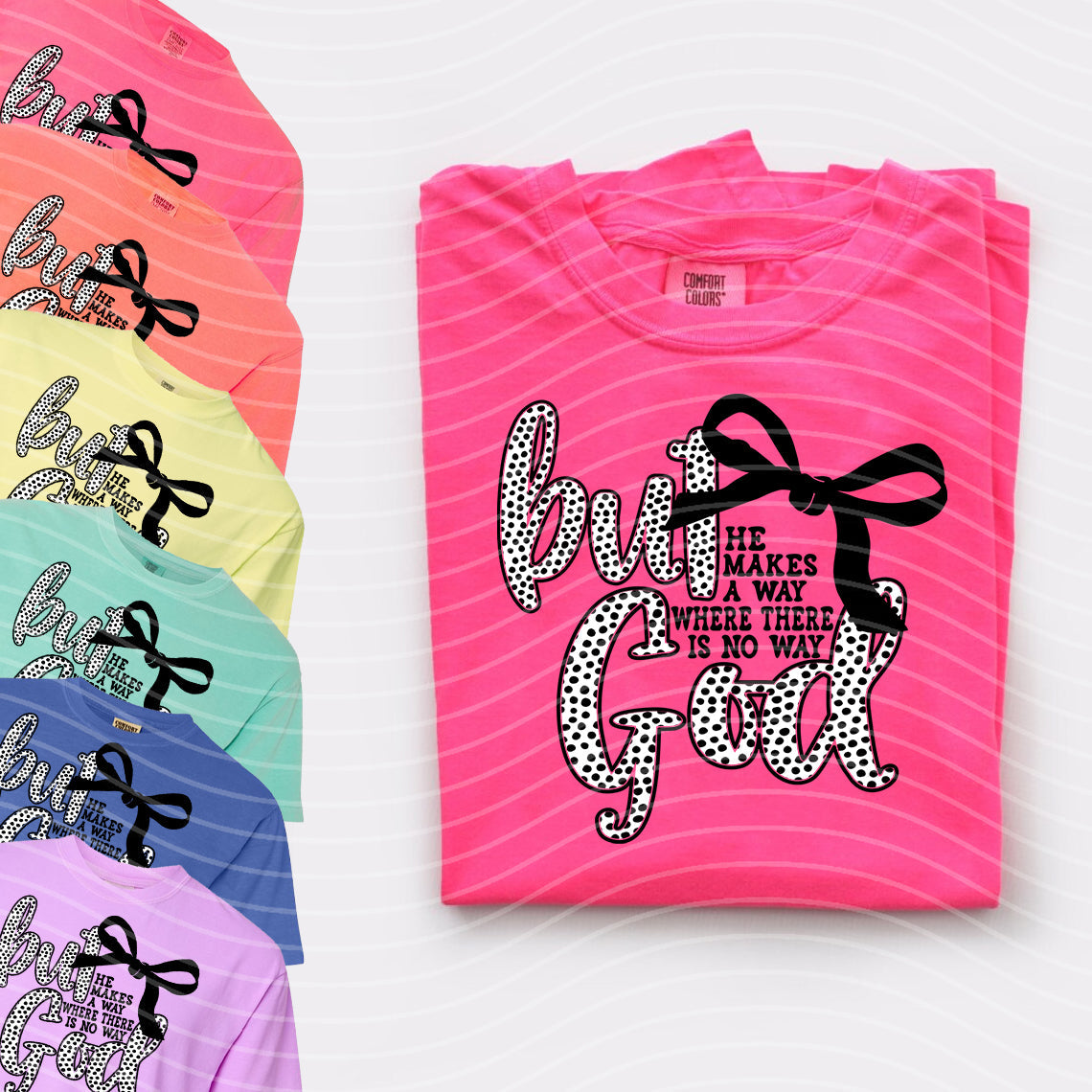 Black But God graphic tee from Anchored Grace Boutique featuring a bold white religious message on the front.