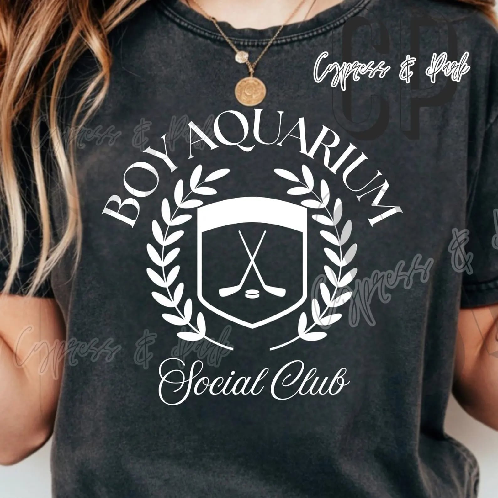 Boy wearing Anchored Grace Boutique's Aquarium Social Club graphic tee featuring colorful aquatic-themed print.