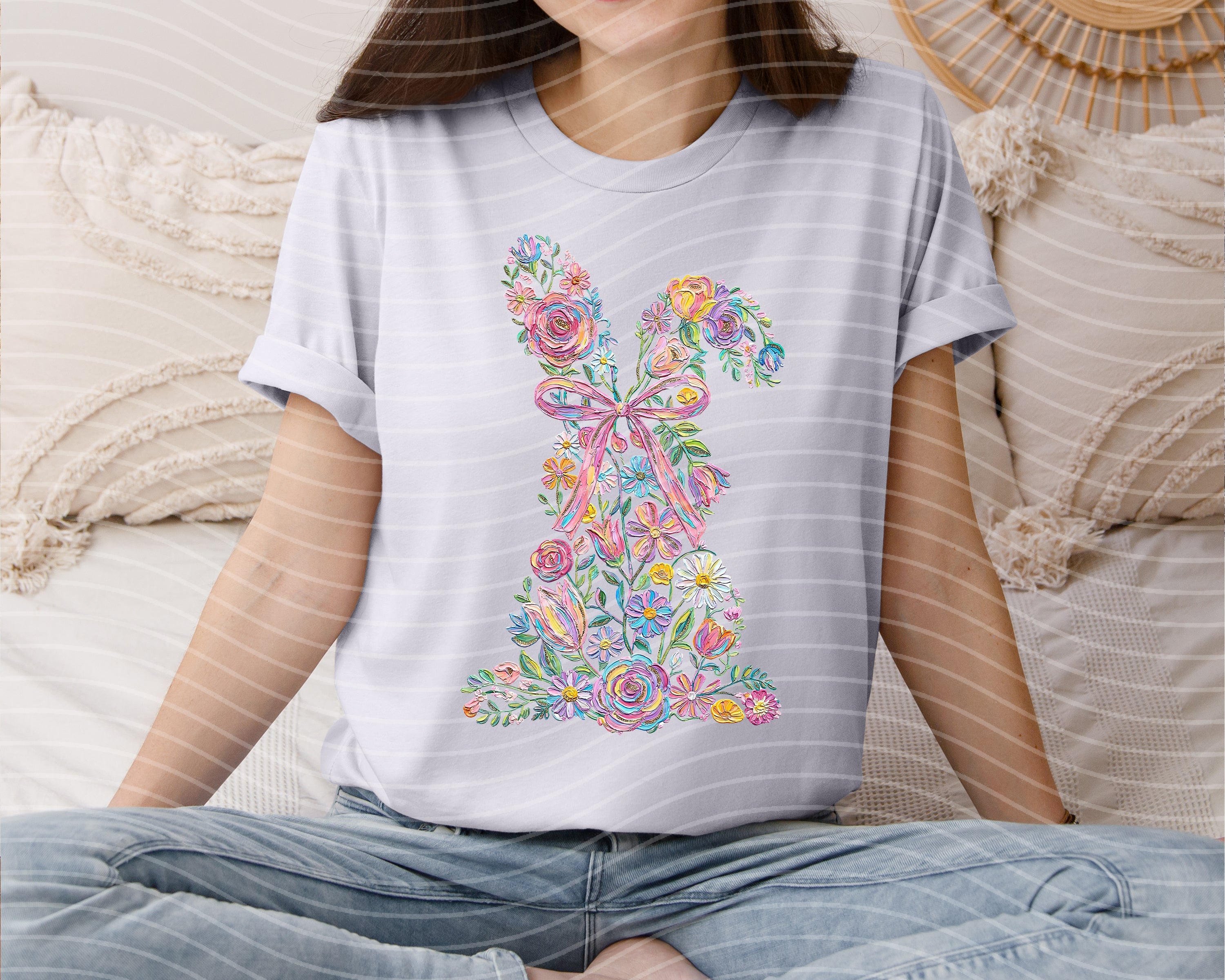 Floral bunny graphic tee from Anchored Grace Boutique featuring colorful bunny and floral design on soft cotton fabric.