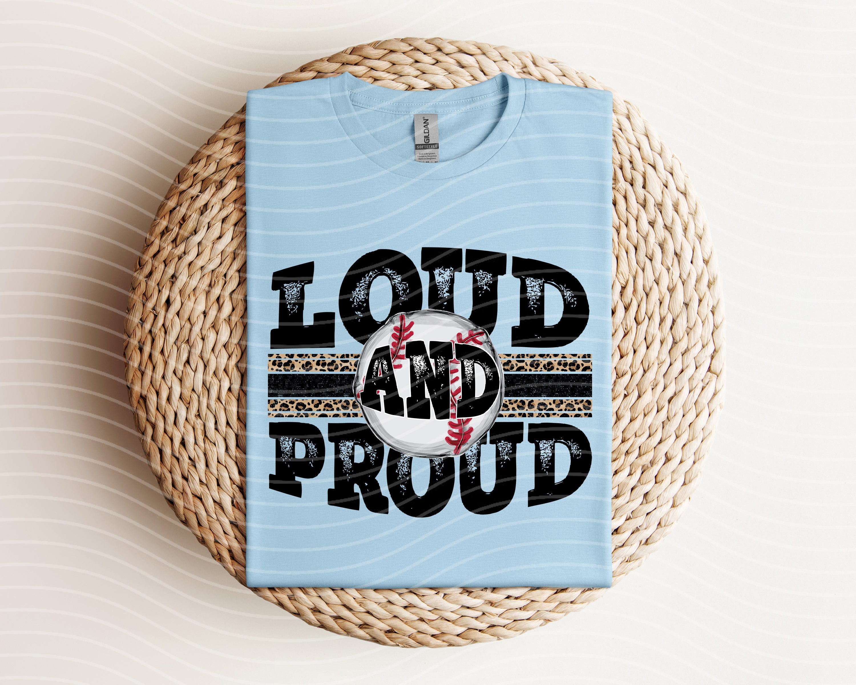 Loud and Proud baseball graphic tee by Anchored Grace Boutique featuring bold lettering and casual fit on model.
