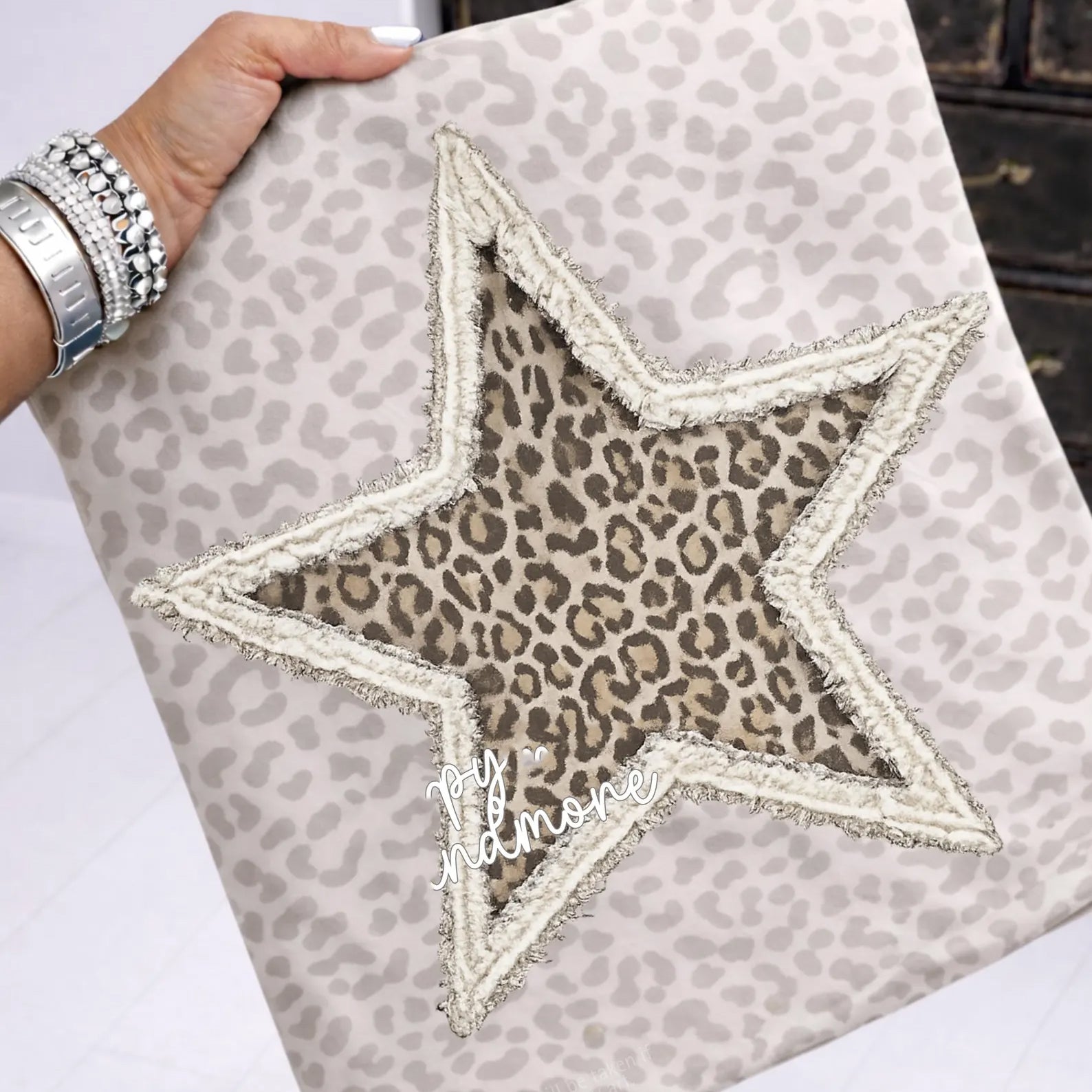 Leopard star graphic T-shirt by Anchored Grace Boutique featuring a bold star and leopard print design on soft fabric.