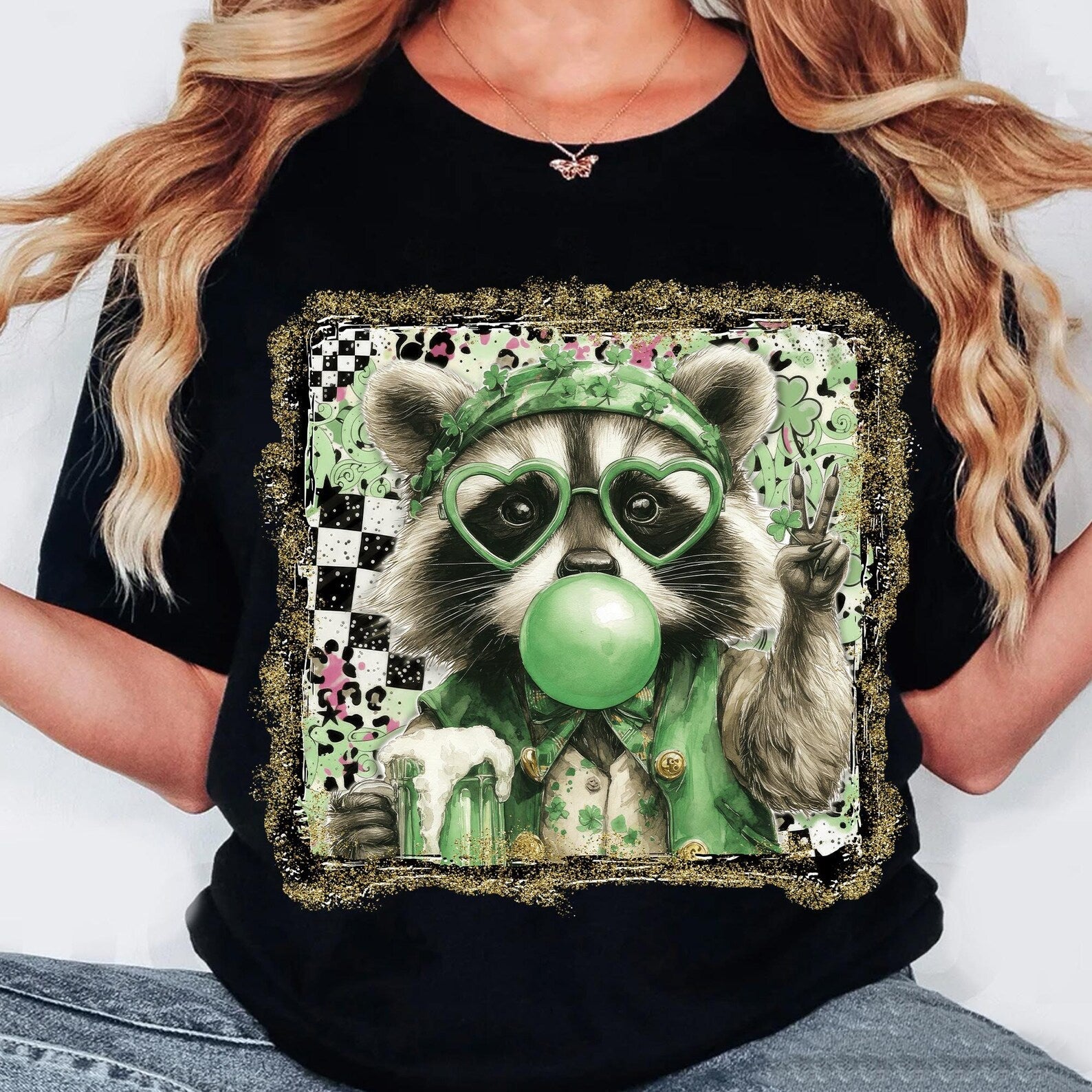 Lucky Raccoon graphic tee by Anchored Grace Boutique featuring a playful raccoon design on soft cotton fabric.