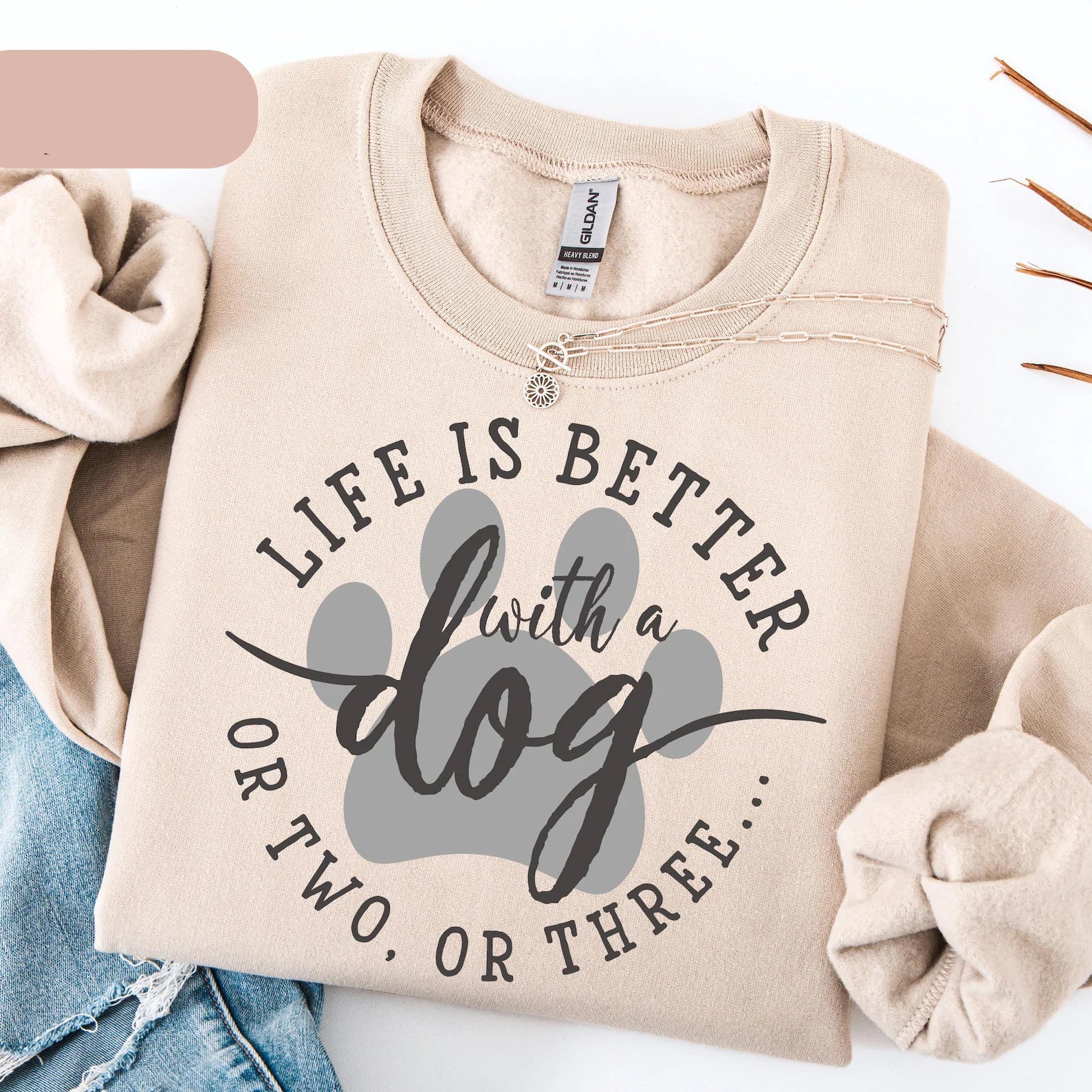 Gray graphic tee from Anchored Grace Boutique featuring "Life is Better With a Dog" slogan and dog illustration.