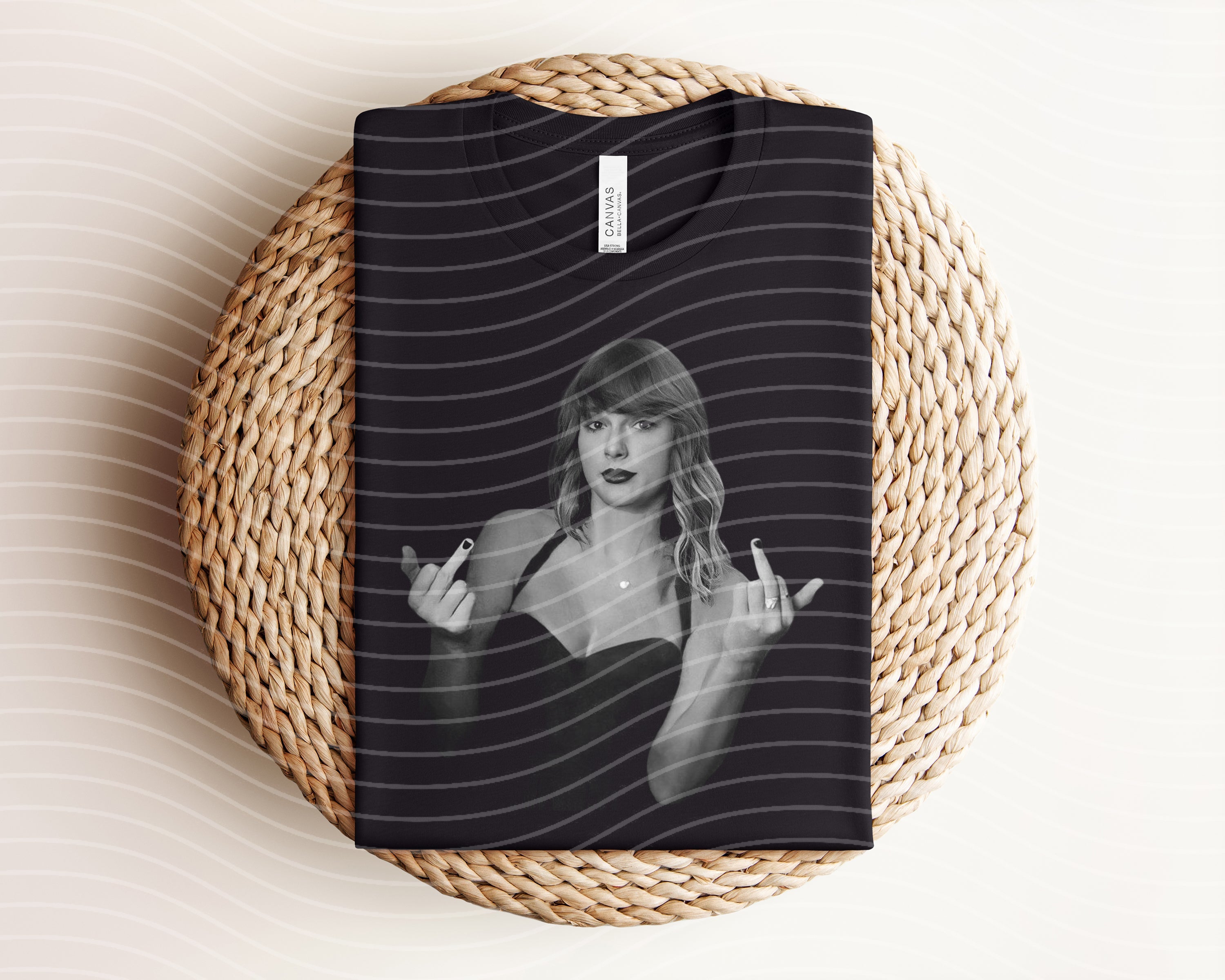 Black and white TS graphic tee from Anchored Grace Boutique, featuring bold graphic design on a casual cotton T-shirt.