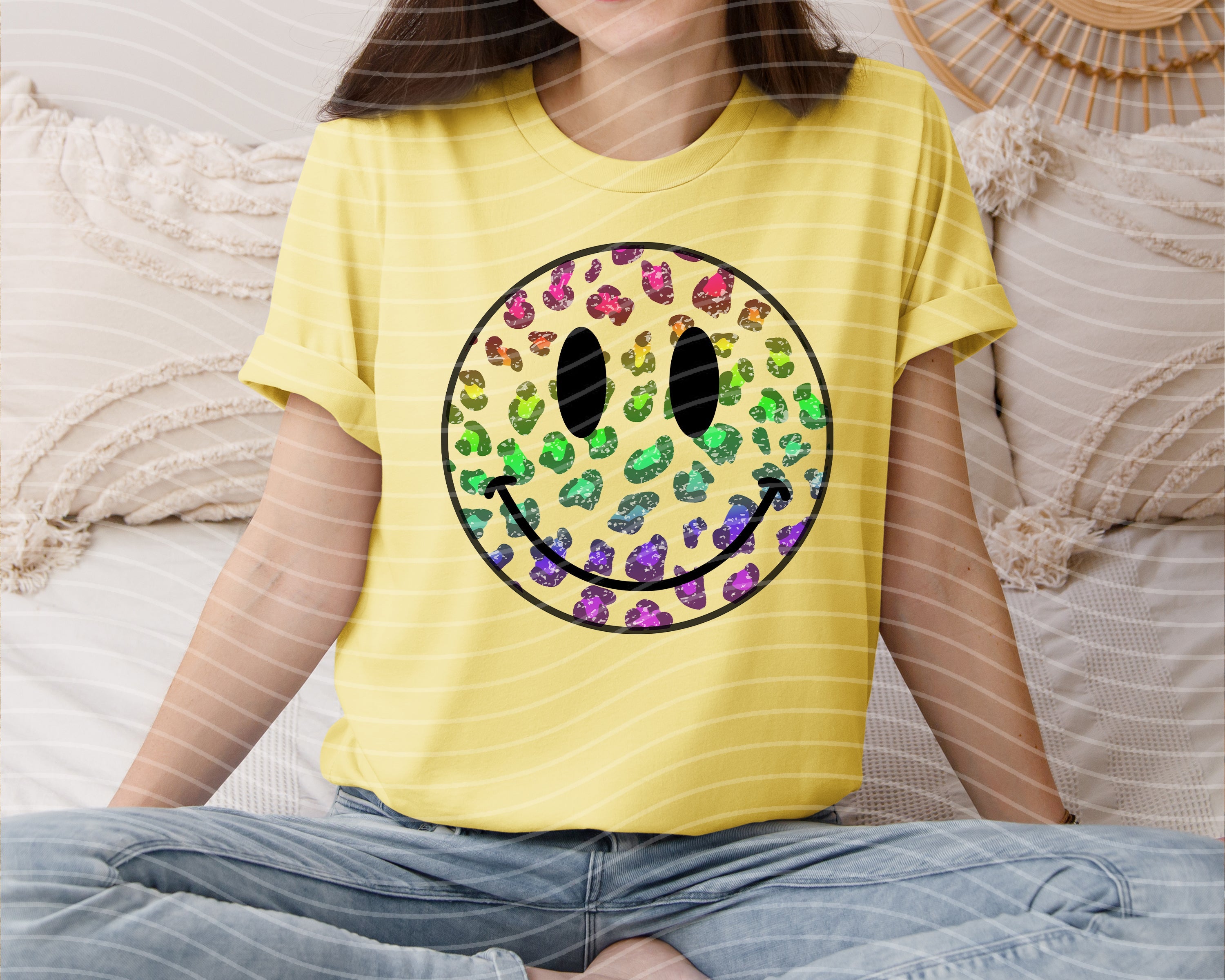 Leopard and happy face graphic tee by Anchored Grace Boutique, featuring a stylish design on a casual cotton t-shirt.