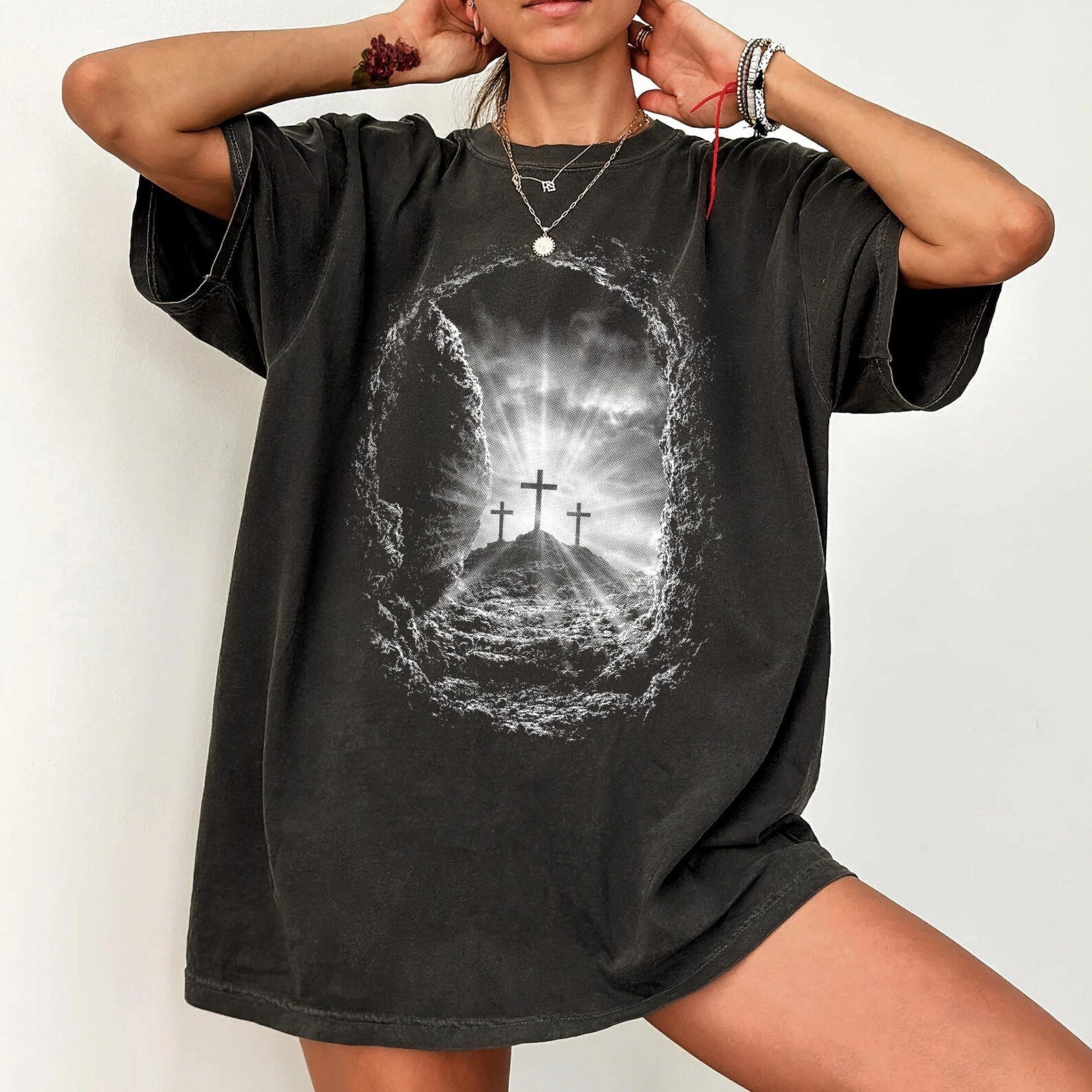 Black and white crosses graphic tee from Anchored Grace Boutique, featuring a stylish design on a casual t-shirt.