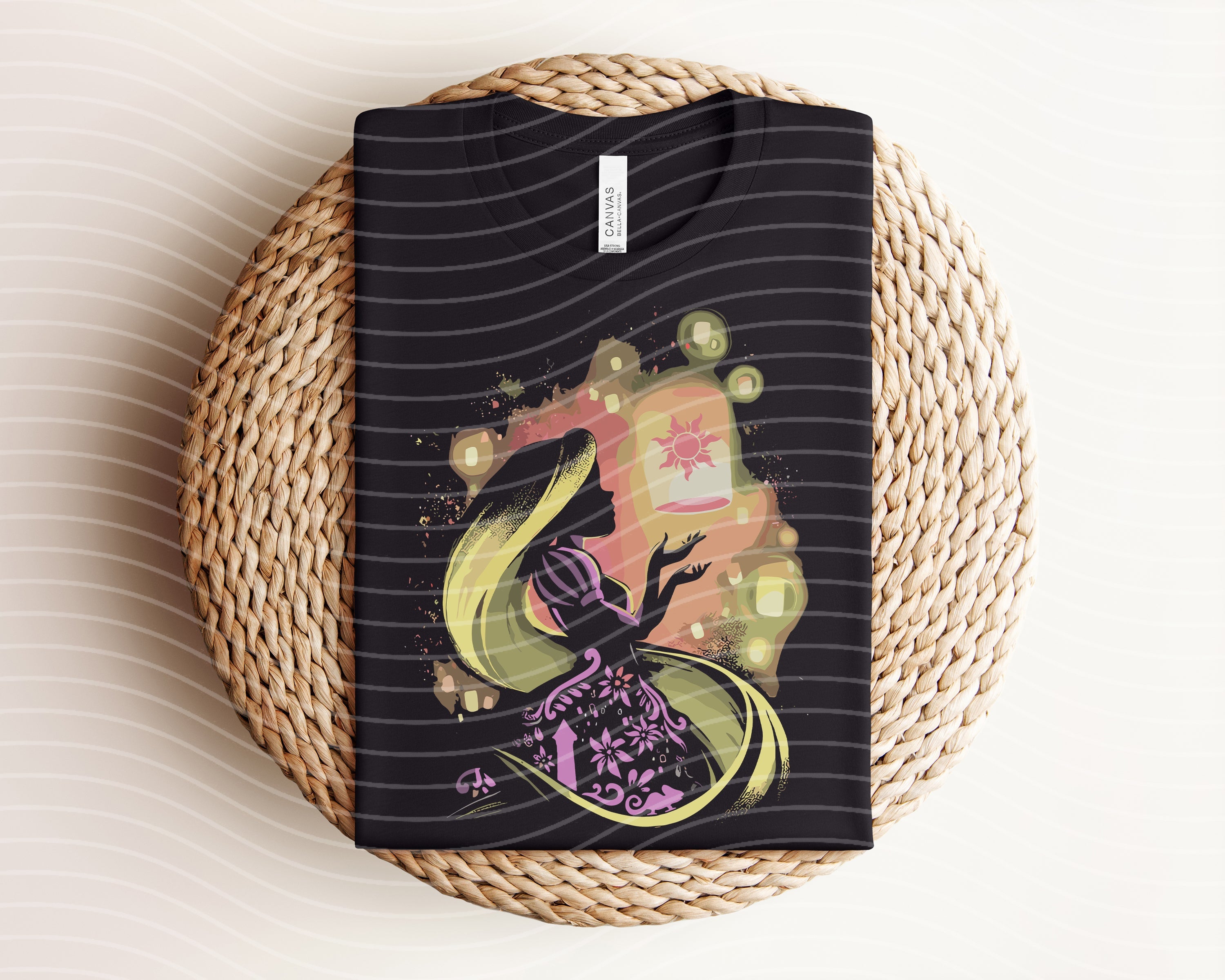 Dark graphic tee featuring Rapunzel design from Anchored Grace Boutique, casual women’s clothing with detailed printed artwork.