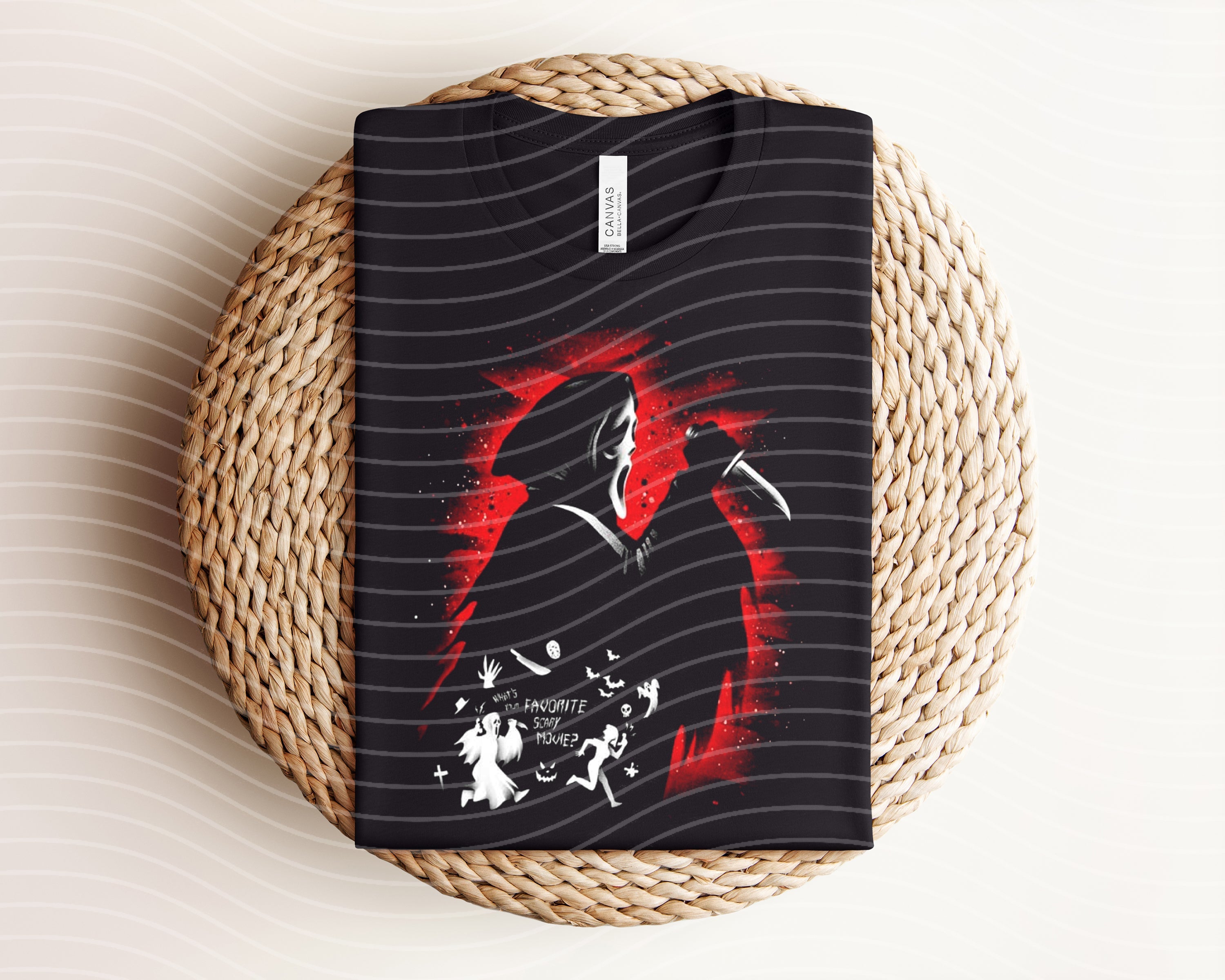 Ghostface dark graphic tee from Anchored Grace Boutique featuring horror-inspired design and bold black artwork on a casual t-shirt
