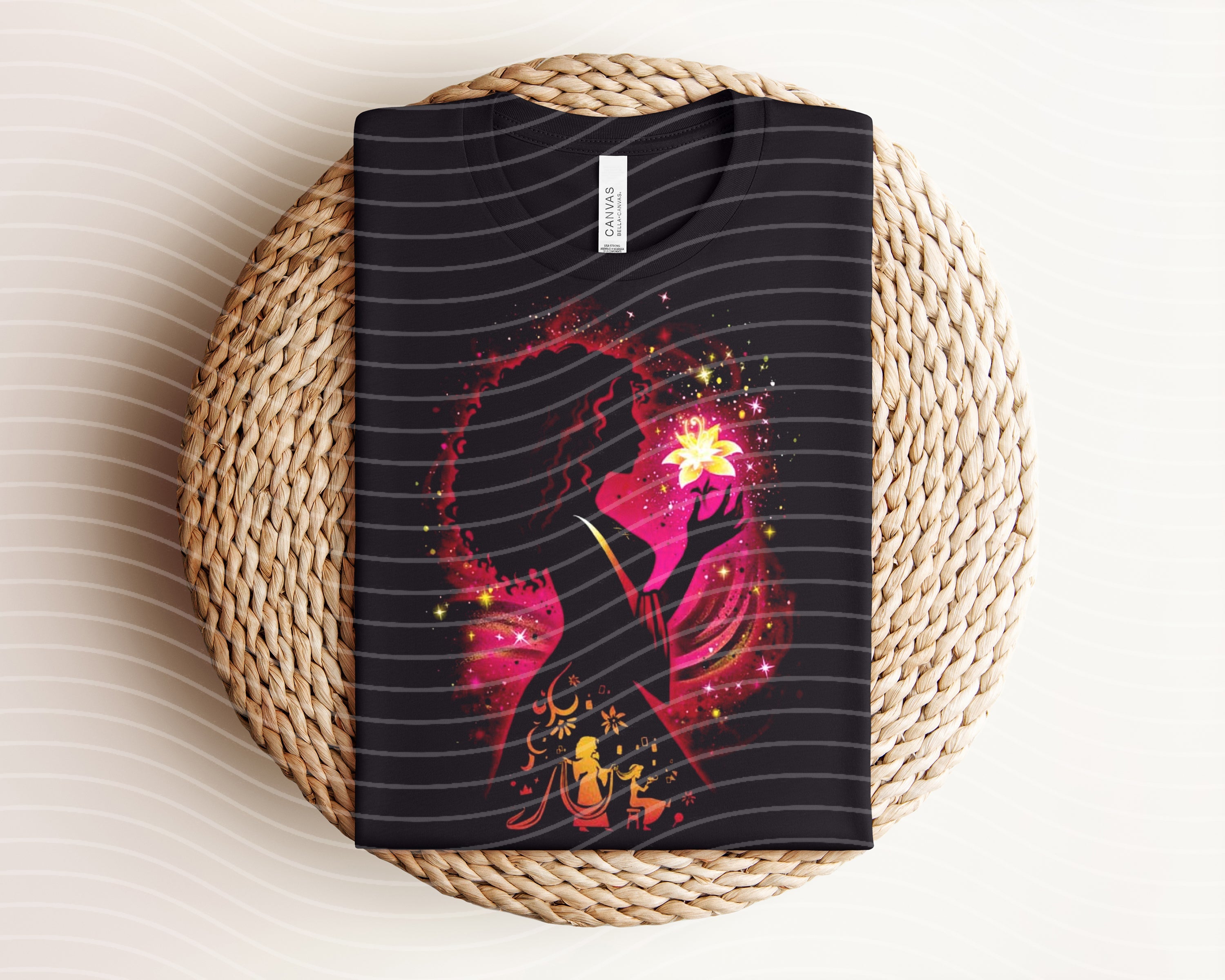 Dark graphic tee featuring Mother Gothel design from Anchored Grace Boutique, with detailed black and white illustration.