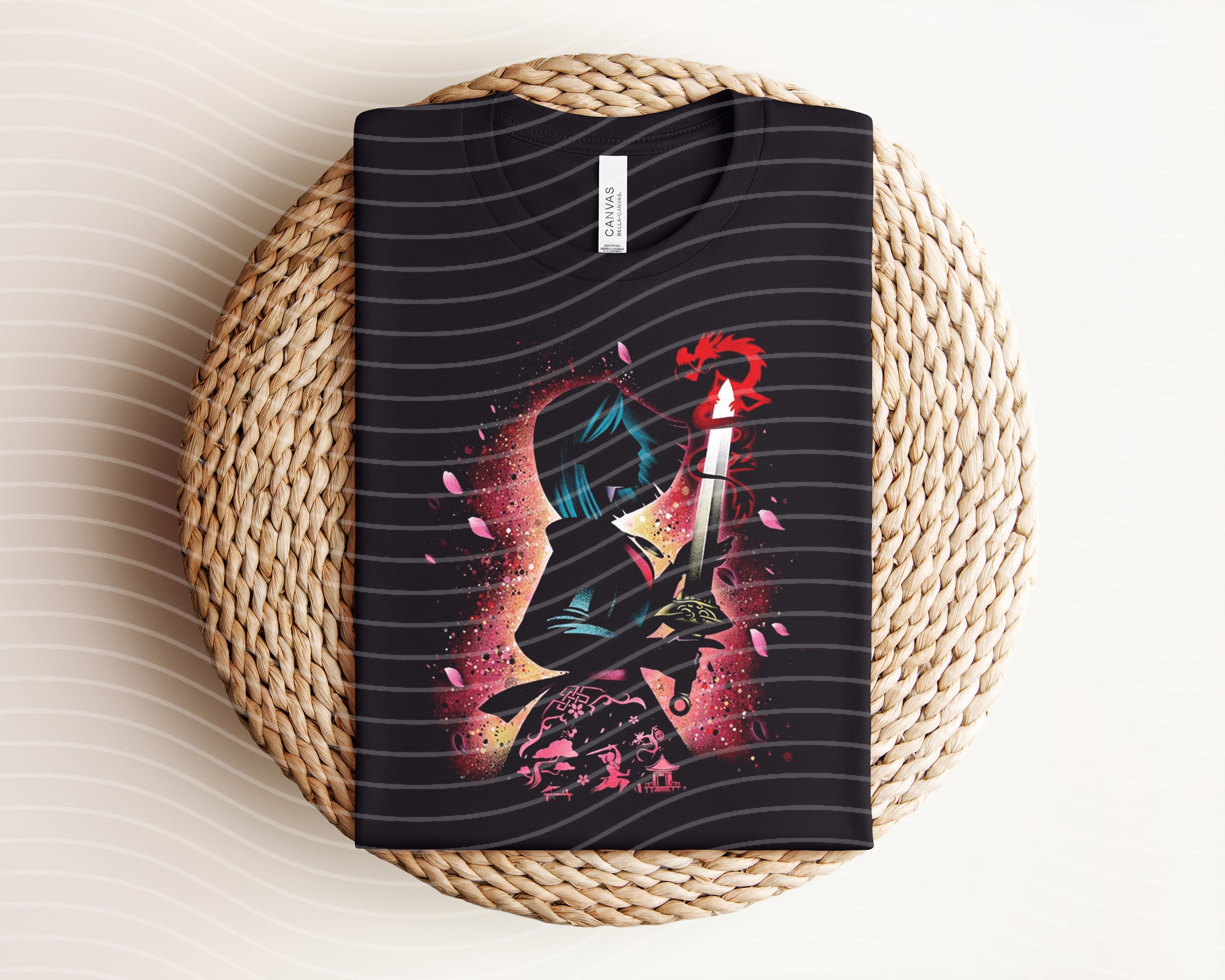 Dark graphic tee featuring Mulan design from Anchored Grace Boutique, with a bold, artistic illustration on soft cotton fabric.