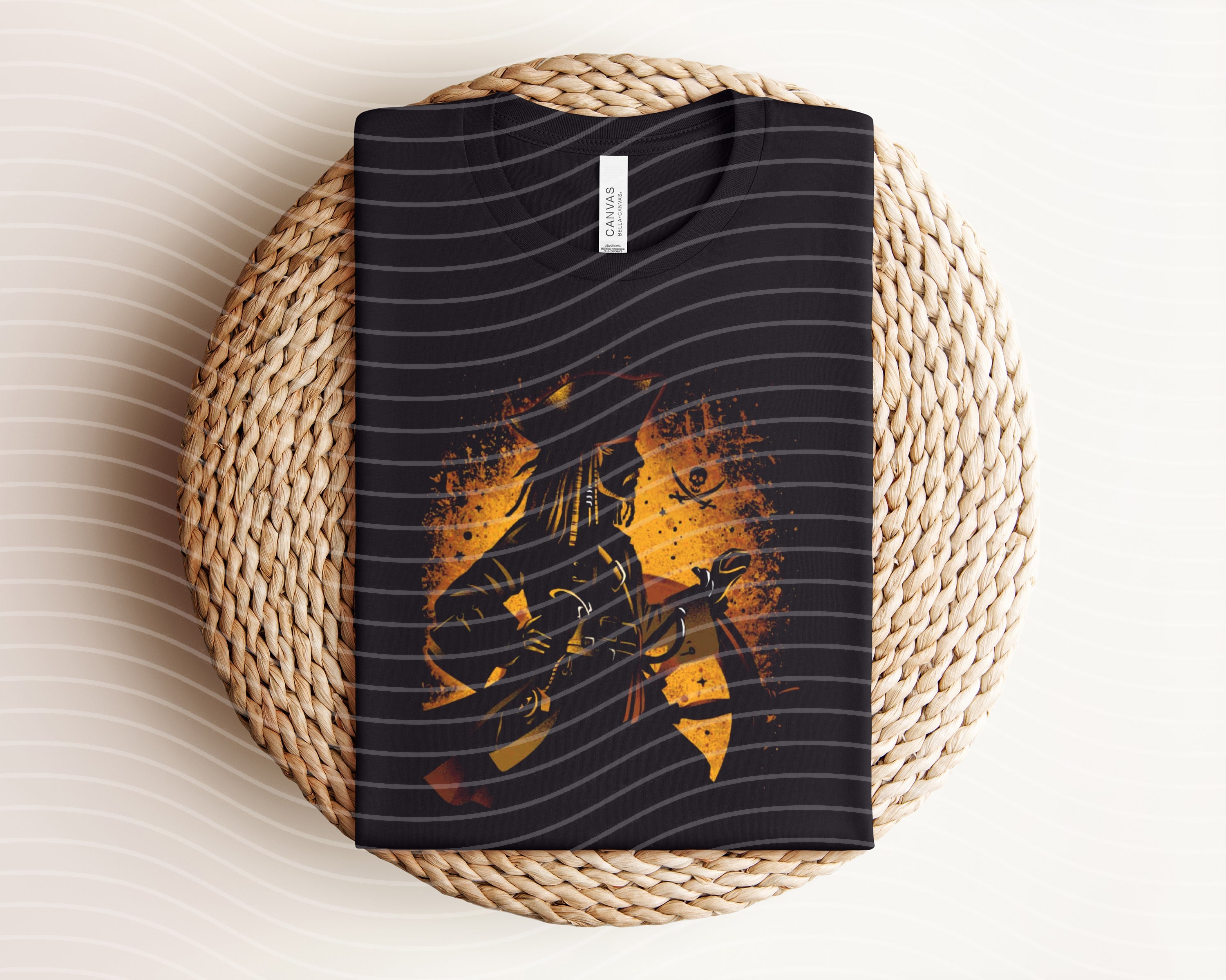 Jack Sparrow dark graphic tee from Anchored Grace Boutique featuring a detailed pirate graphic design on black cotton fabric.