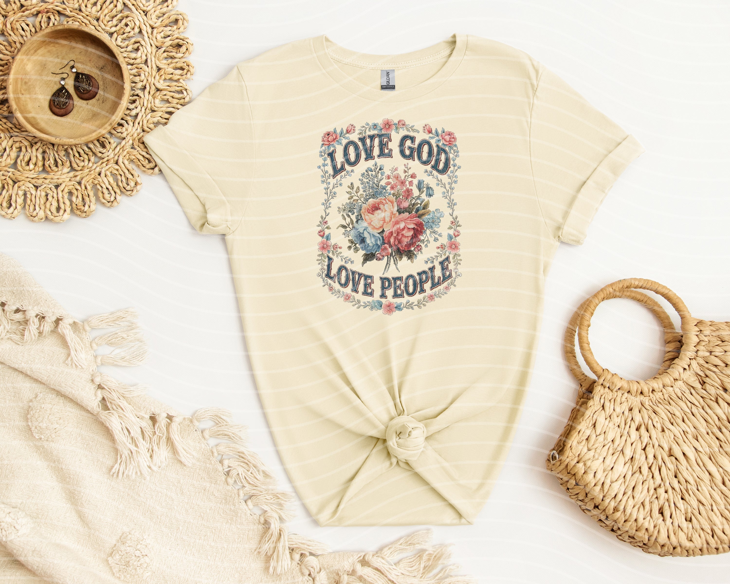 Black graphic tee from Anchored Grace Boutique featuring "Love God Love People" inspirational design on soft cotton fabric.