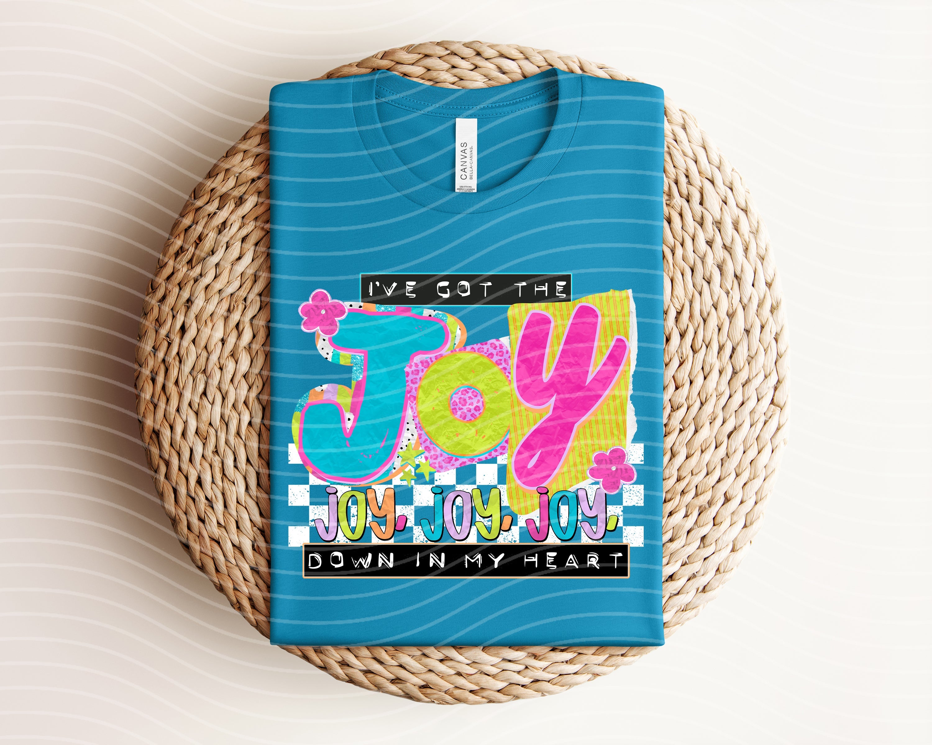 Black graphic tee from Anchored Grace Boutique with "I've Got the Joy Down in My Heart" print, casual and stylish.