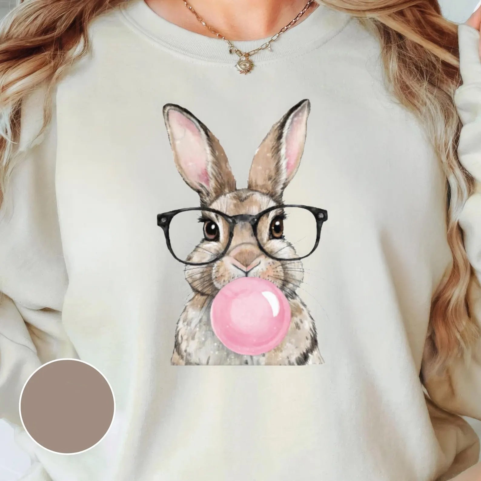 Pink bubblegum bunny graphic tee by Anchored Grace Boutique, featuring a playful bunny design on a casual cotton t-shirt.