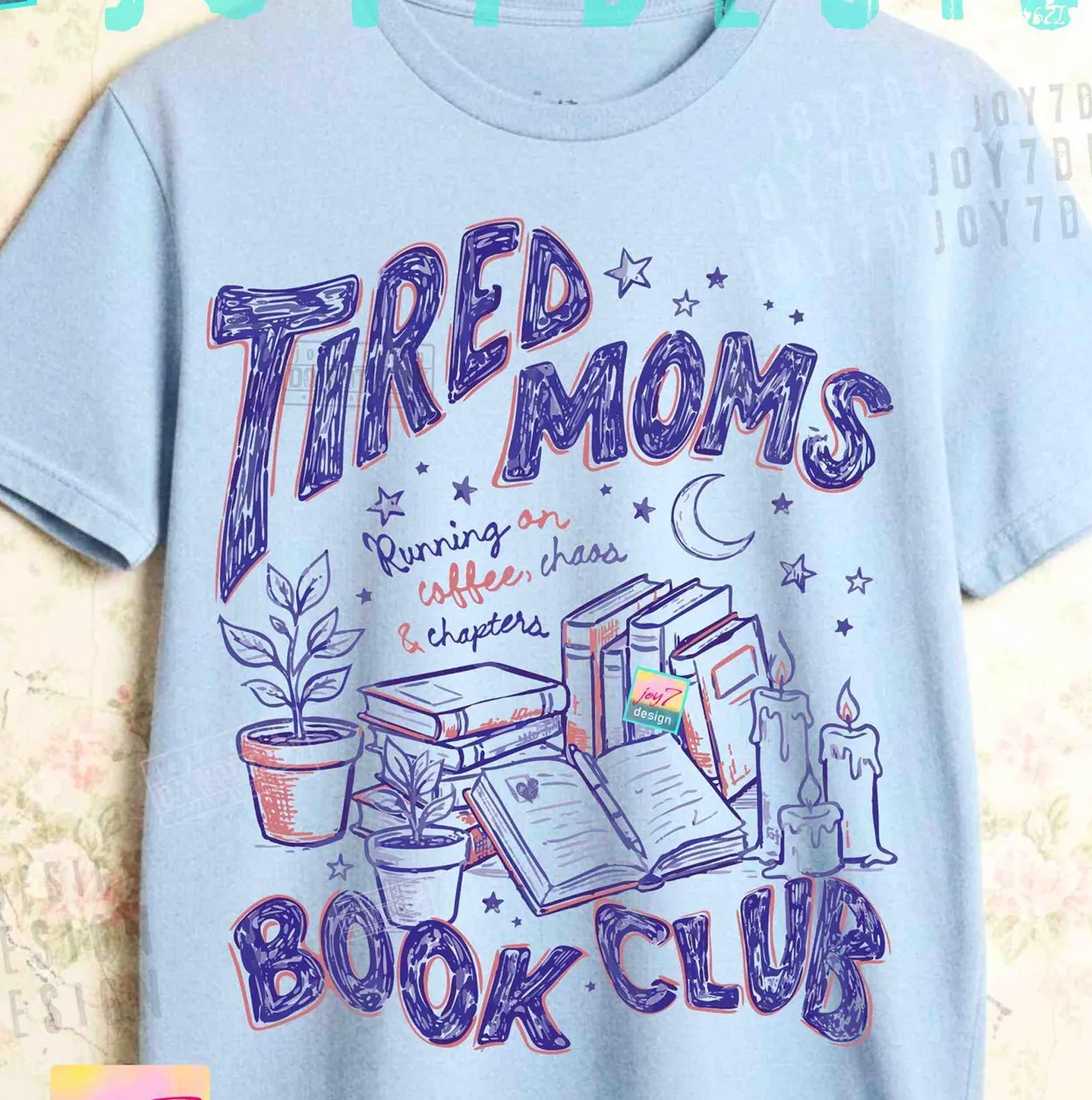 Tired Moms Book Club graphic tee by Anchored Grace Boutique, featuring a casual cotton t-shirt with fun book club print.