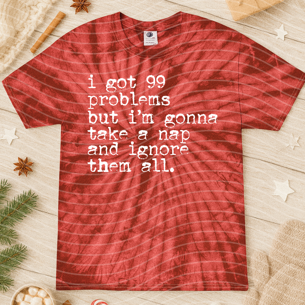 Black graphic tee with "I Got 99 Problems" slogan in white lettering, casual style from Anchored Grace Boutique.