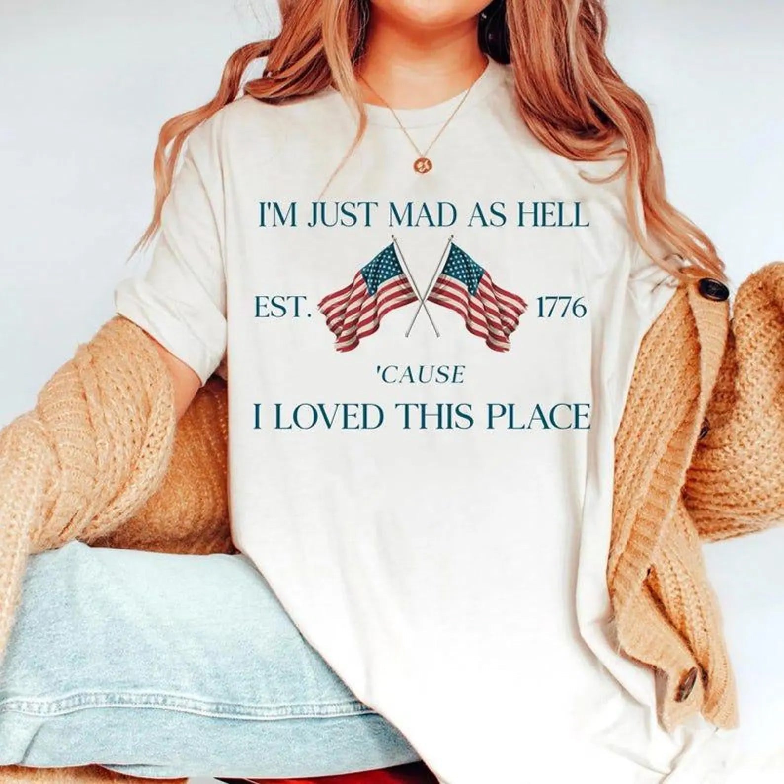 Black graphic tee from Anchored Grace Boutique featuring the phrase "I Loved This Place" in stylish white lettering.