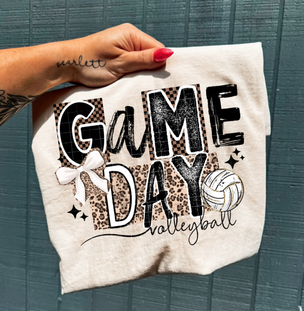 Game Day Volleyball graphic tee by Anchored Grace Boutique, featuring a vibrant volleyball design on a casual cotton shirt.
