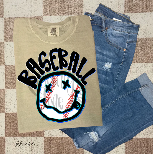 Gray baseball graphic tee from Anchored Grace Boutique featuring a cheerful happy graphic design on the front.