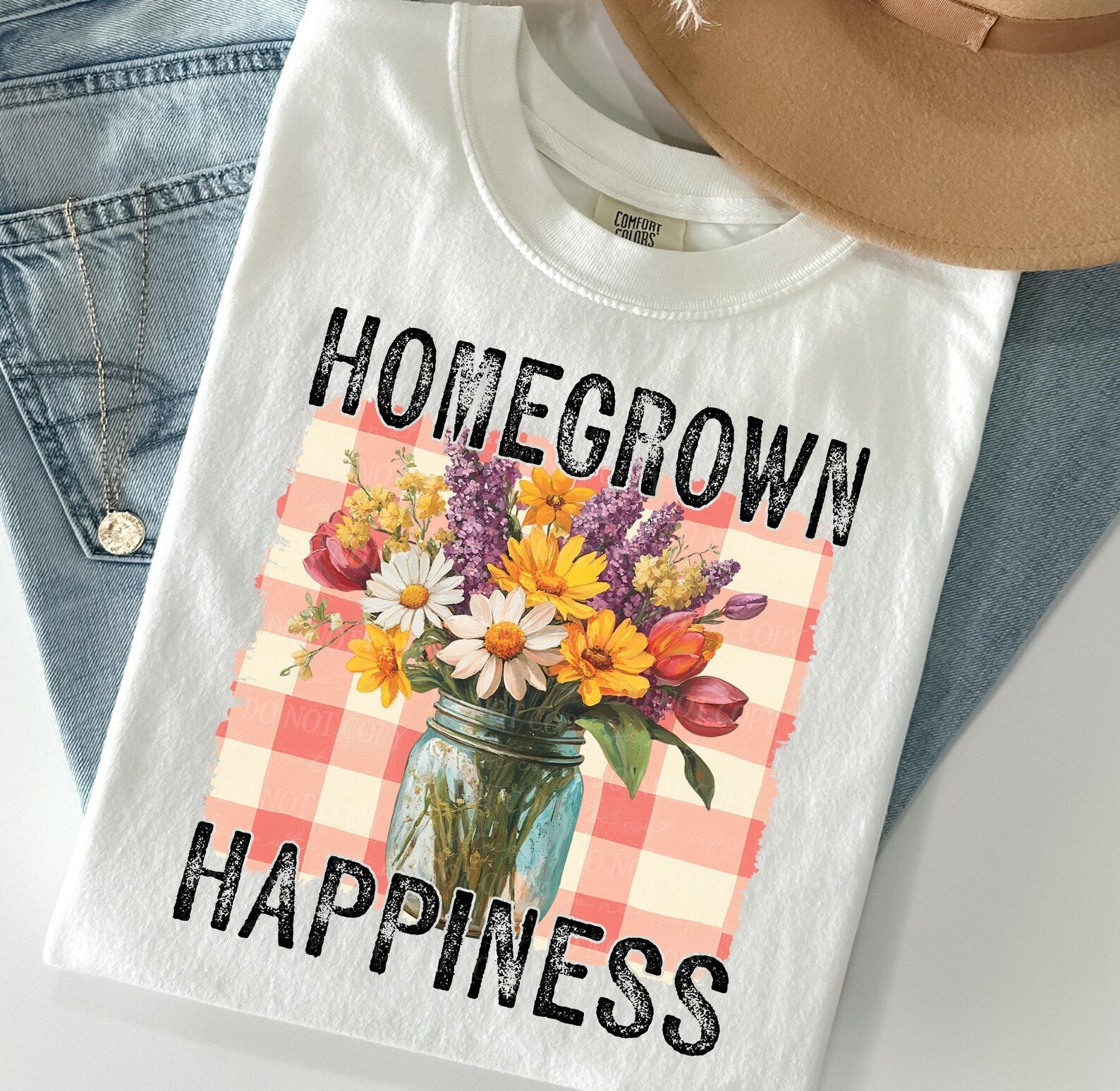 Homegrown Happiness graphic tee by Anchored Grace Boutique featuring a vibrant, stylish design on a comfortable casual t-shirt.