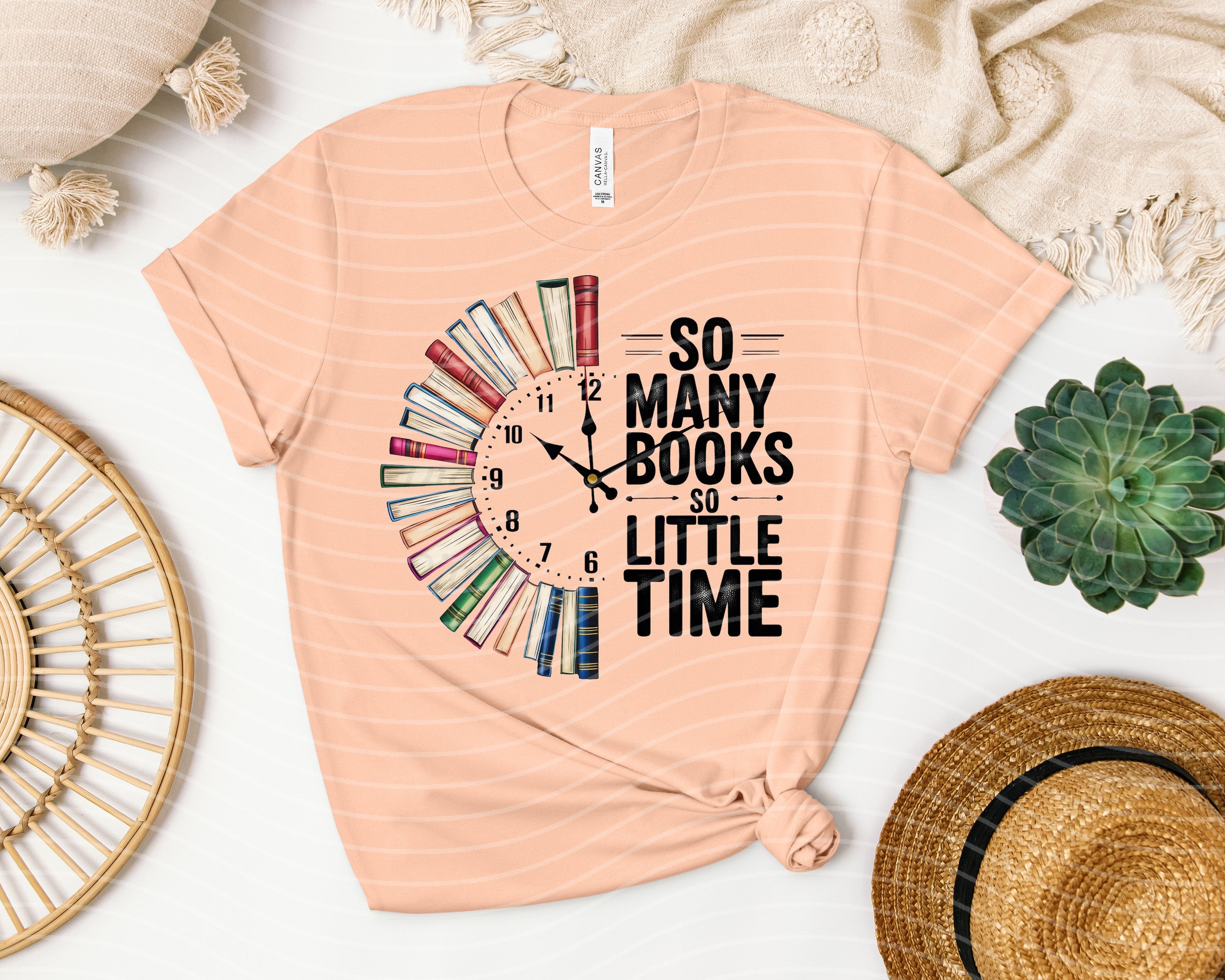 Black graphic tee from Anchored Grace Boutique with "So Many Books So Little Time" printed design on the front.