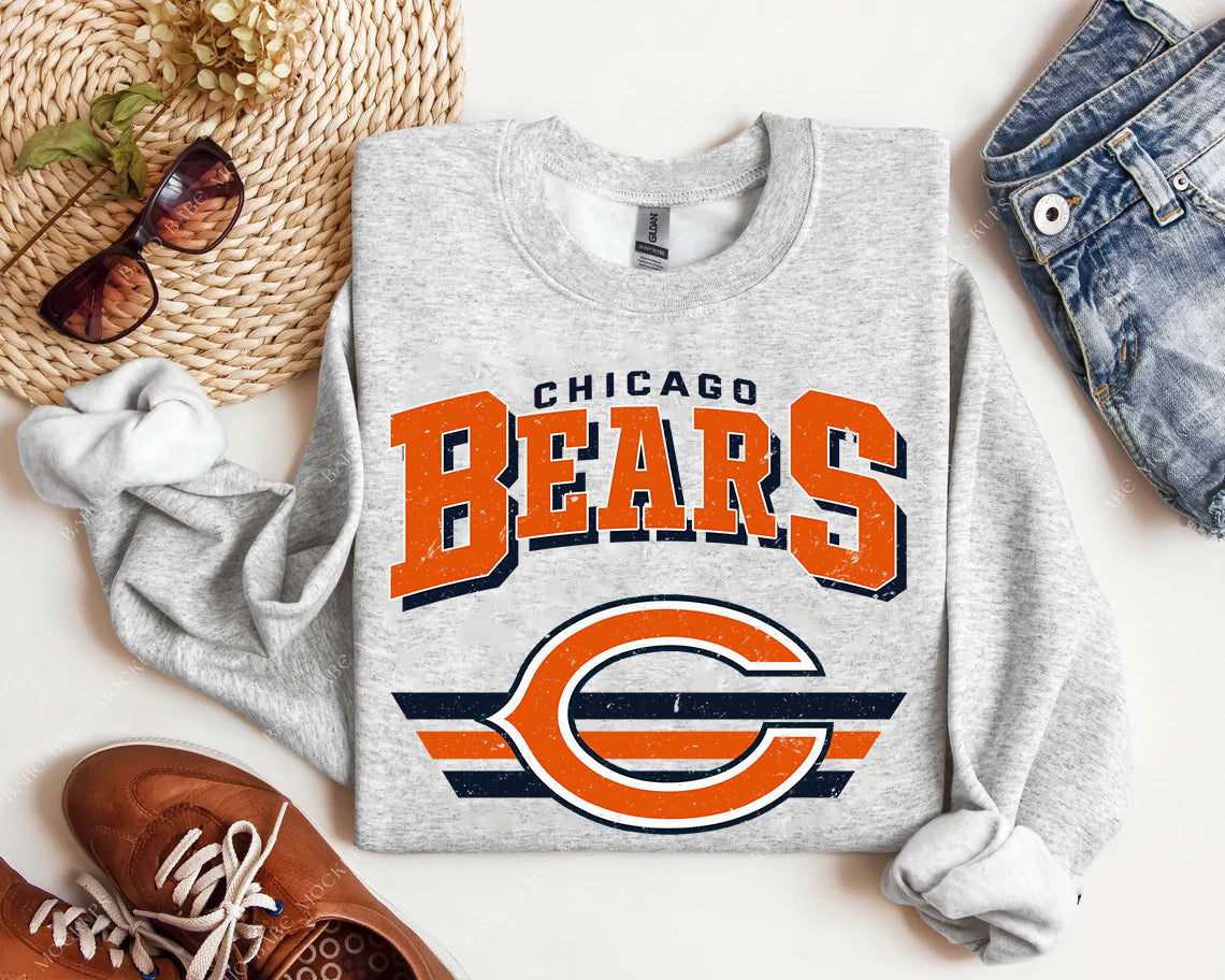 Vintage Team Bears graphic tee by Anchored Grace Boutique featuring retro bear illustrations on soft cotton fabric.