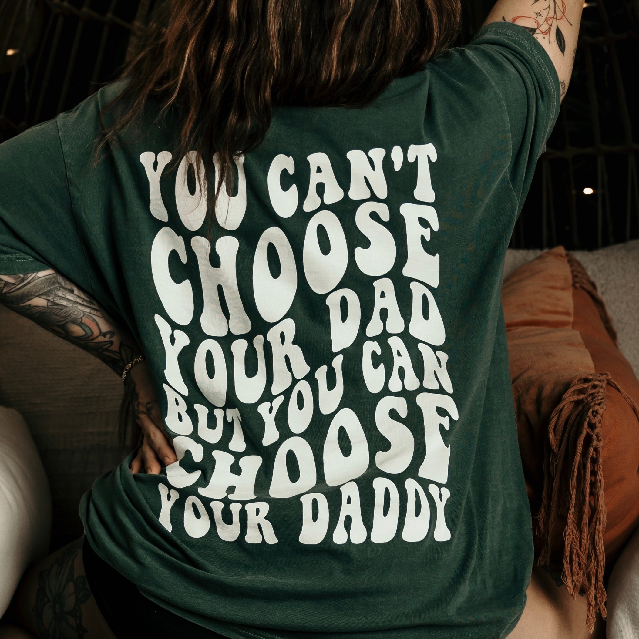 Choose Your Daddy graphic T-shirt by Shop Karma Tees, featuring a bold, colorful design on a casual cotton tee.