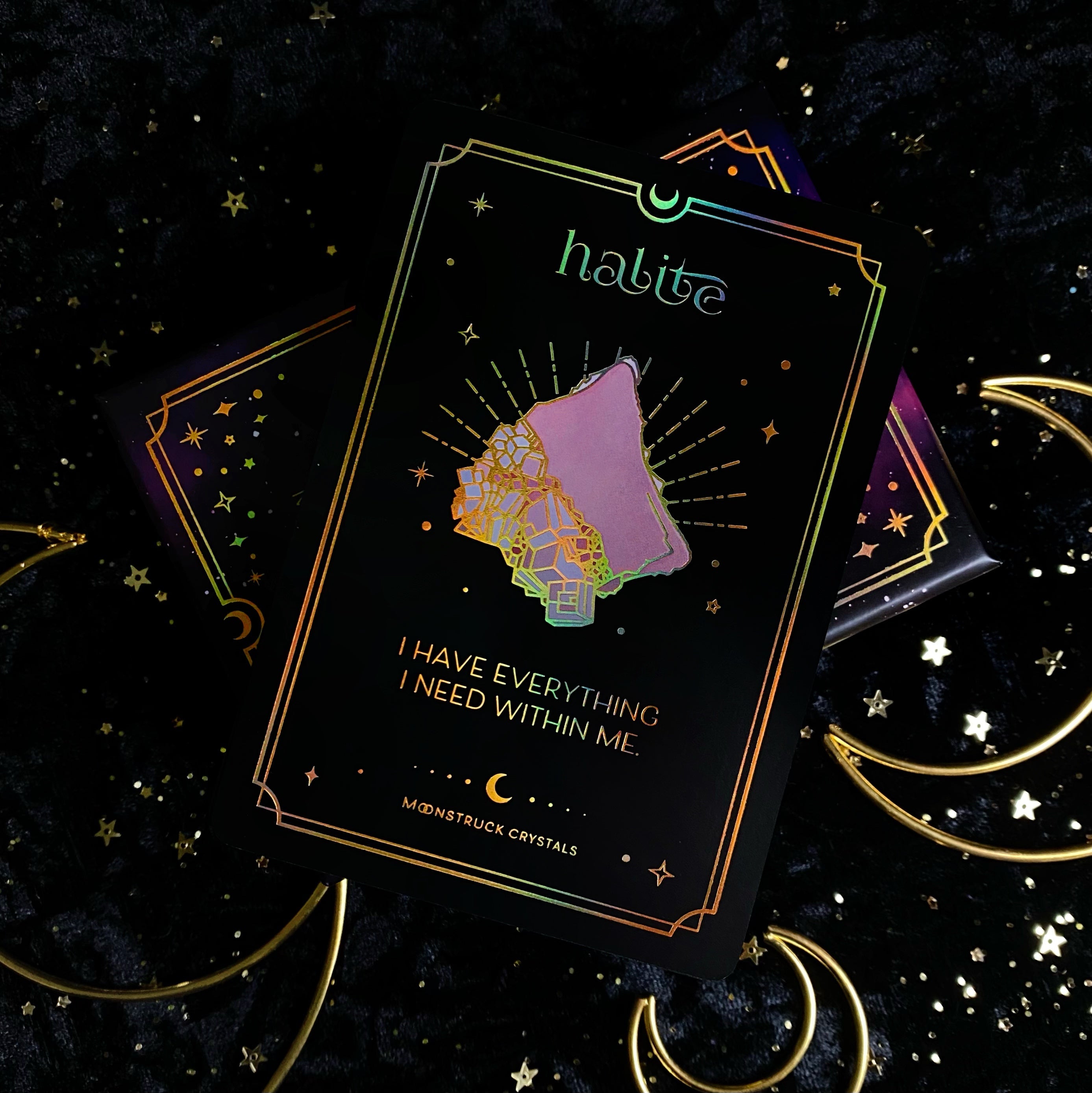 Gold Crystal Affirmations Golden Aura Edition card deck by Moonstruck Crystals, featuring luminous gold and crystal-themed affirmation cards.