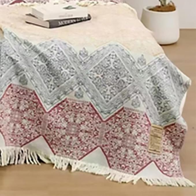 CozyNest Decor boho muslin twin-size cotton blanket with floral design, tassels, soft gauze fabric, perfect for sofa or bed use.