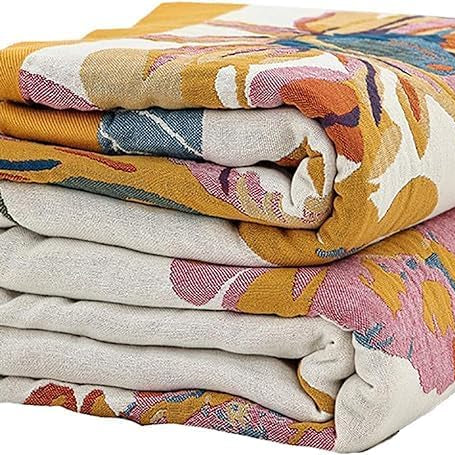 CozyNest Decor boho cotton throw blanket with floral, bird, and butterfly print, perfect for bed, sofa, or chair decor.
