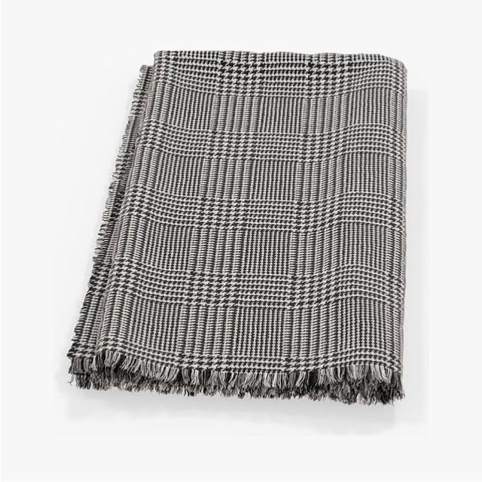 CozyNest Decor insect-repellent outdoor throw blanket with houndstooth pattern, lightweight, perfect for camping, picnics, and beach trips.