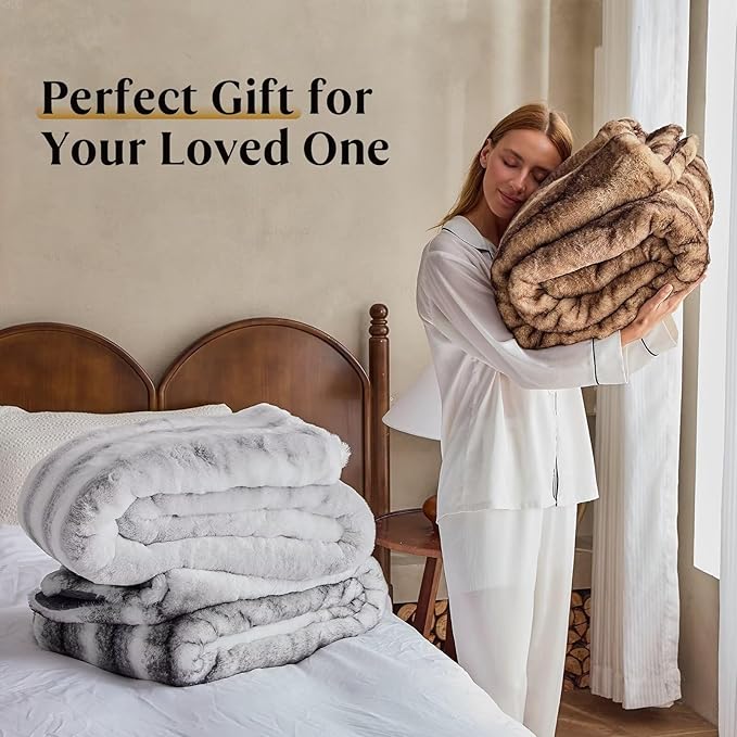 CozyNest Decor luxury black and white faux fur bed blanket, soft plush throw on a bed, fluffy and reversible for living room or bedroom.