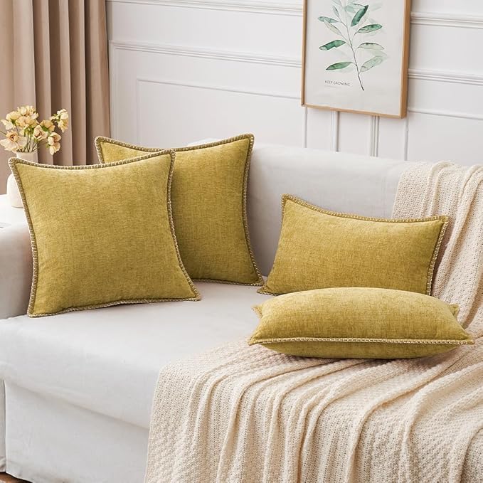 Two mustard yellow CozyNest Decor throw pillow covers, 12x20 inches, soft chenille with stitched edges for sofa or bed decor.
