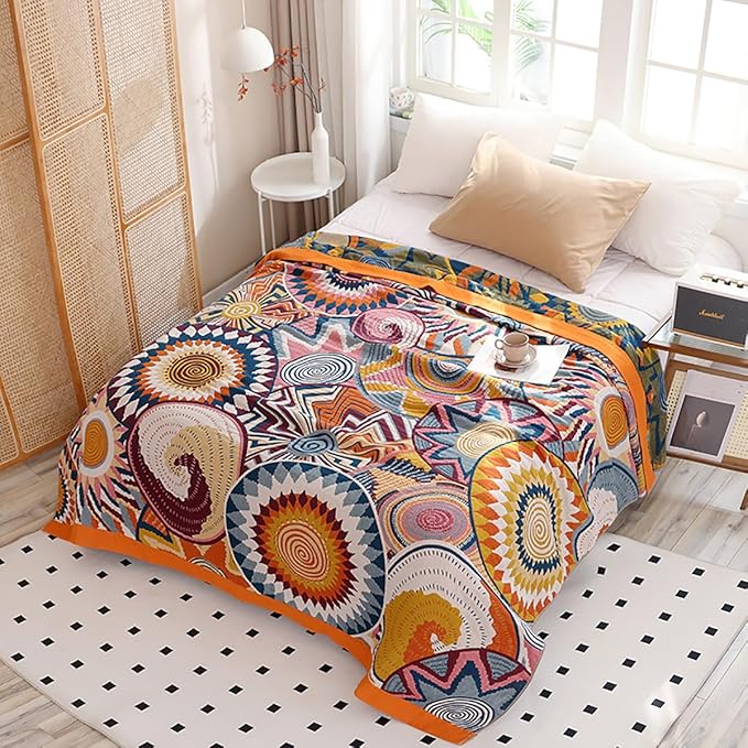 CozyNest Decor boho twin size muslin blanket with floral star pattern, 4-layer cotton gauze, soft and cooling for sofa or bed.
