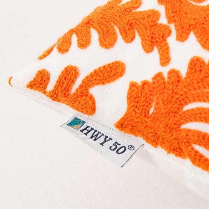 CozyNest Decor orange floral embroidered throw pillow cover, 18x18 inches, cotton farmhouse cushion for sofa or bed.