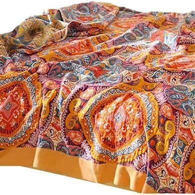 Boho orange muslin bed blanket by CozyNest Decor, 80x90 inches, soft 4-layer gauze cotton with floral geometric design.