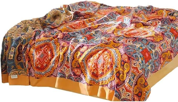 Boho orange muslin bed blanket by CozyNest Decor, 80x90 inches, soft 4-layer gauze cotton with floral geometric design.