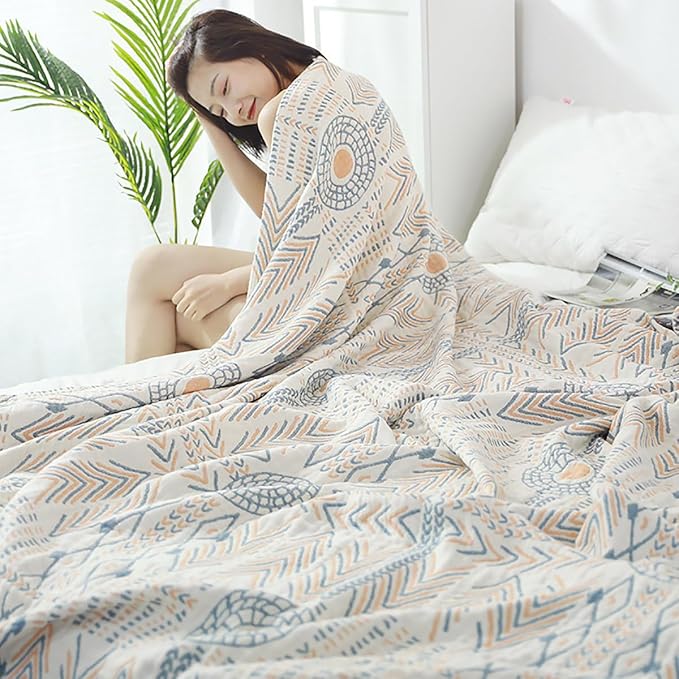 CozyNest Decor boho striped muslin twin size cotton bed blanket with 4-layer gauze, soft and breathable for sofa or bed.