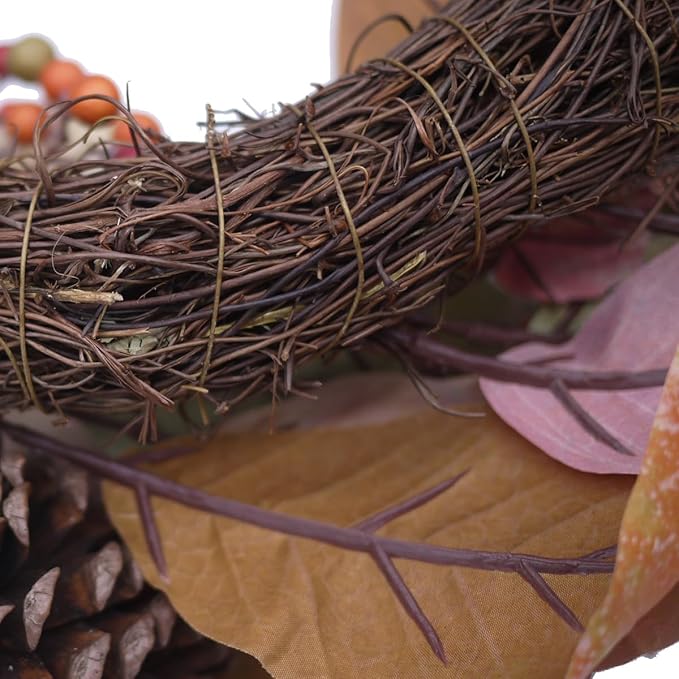 CozyNest Decor 24-inch artificial fall magnolia leaf wreath with berries, orange pinecones for door, wall, or farmhouse decor.