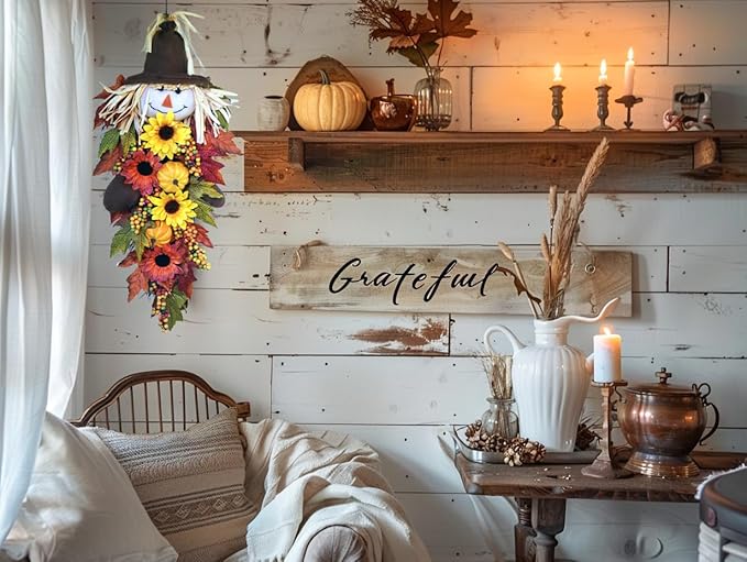 Rustic 24-inch fall scarecrow teardrop swag with sunflowers and pumpkins, ideal for farmhouse front door, porch, or wall decor.