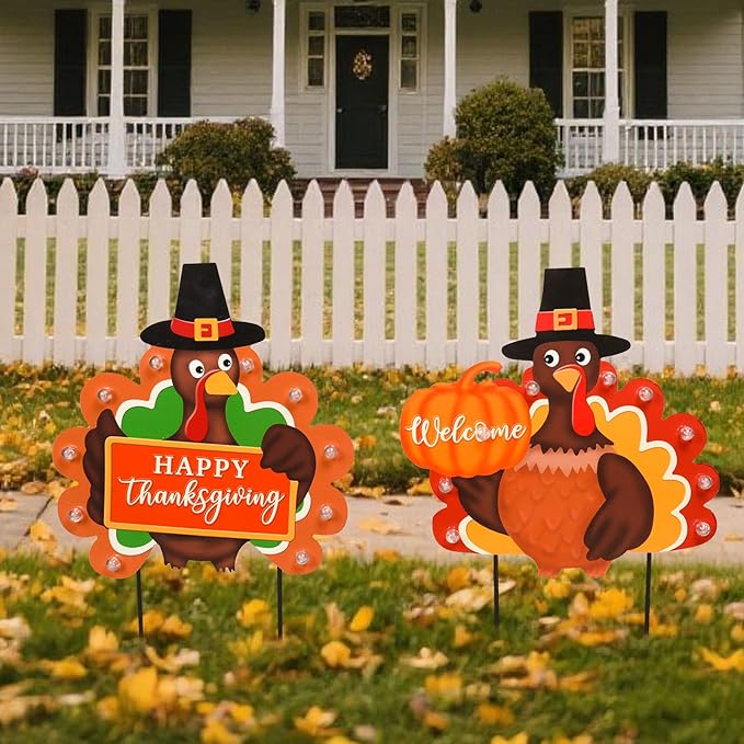 Outdoor metal garden stakes with LED lights, featuring Happy Thanksgiving, pumpkin, and turkey designs for fall harvest decor.