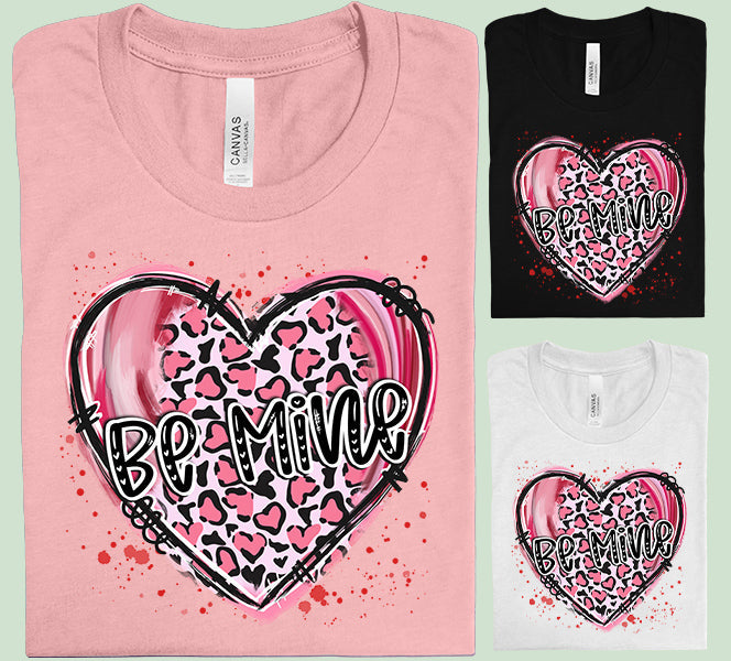 Be Mine graphic tee from Anchored Grace Boutique featuring a stylish design on a casual cotton shirt.