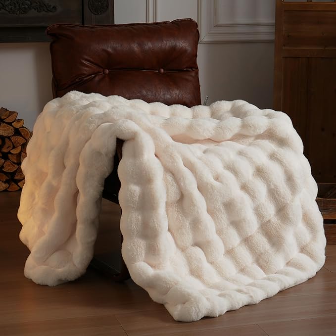 Cream white CozyNest Decor faux fur throw blanket, fluffy and thick, 50x60 inches, perfect for couch or living room decor.