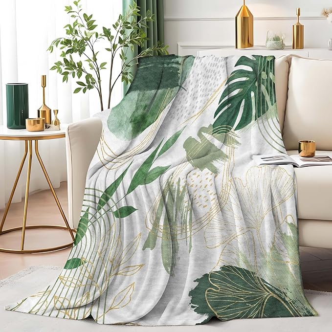 Sage green leaf throw blanket by CozyNest Decor, soft boho flannel with gold accents, 50x60 inches, cozy decorative blanket for sofa or bed