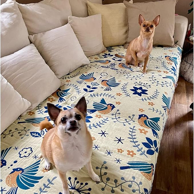 CozyNest Decor fall throw blanket with bird and flower patterns, versatile organic cotton blanket for beds, couches, and vintage décor.